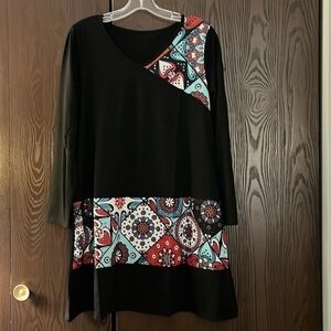 No Brand black dress with pattern at the shoulder and bottom. Size Medium